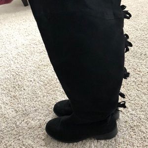 Torrid black suede bow boots.